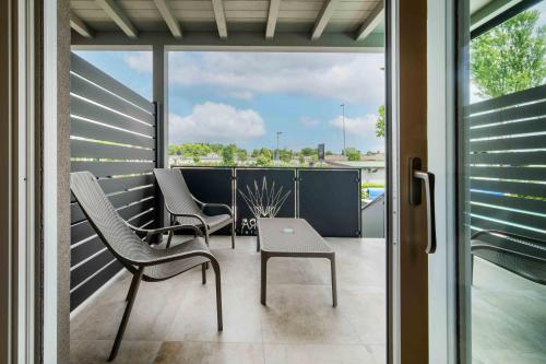 Un balcón o terraza de Aurora ApartHotel