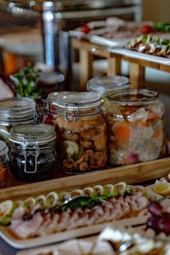 a display of jars of pickles and other food at Hotel SPA Dr Irena Eris Krynica Zdrój in Krynica Zdrój