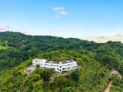 an aerial view of a large house on a hill at Rose Hill Bungalow in Gampola