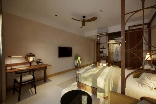 a bedroom with a bunk bed with a desk and a desk at Magnolia Boutique Hue in Thôn Trường Giang