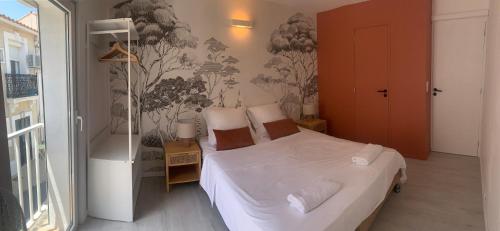 Photo de la galerie de l'établissement La petite maison aux oliviers - Centre Pérols, terrasse, wifi - Calme, à Pérols