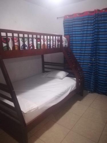 Postel nebo postele na pokoji v ubytování Ibiza village Beach