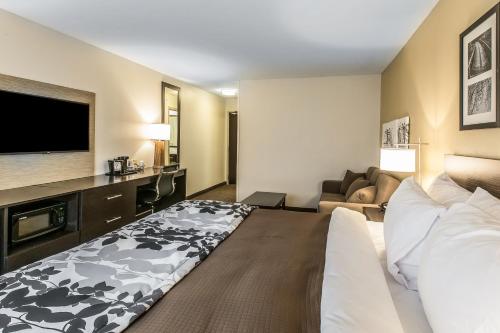 Ένα ή περισσότερα κρεβάτια σε δωμάτιο στο Sleep Inn & Suites Jasper I-22