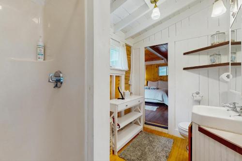 a bathroom with a sink and a toilet at Beach House in Oak Bluffs