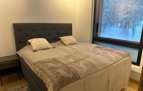 Postel nebo postele na pokoji v ubytování Ski Chalet C23 Ski-in Ski-out by Aavalevi