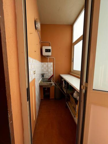 Η κουζίνα ή μικρή κουζίνα στο Tiffany's Apartment Olivarella