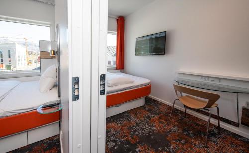 Letto o letti in una camera di HHE Express