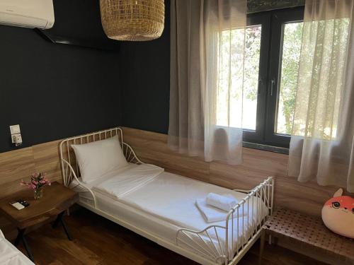 Ένα ή περισσότερα κρεβάτια σε δωμάτιο στο Daskalis House # Даскаловата Къща