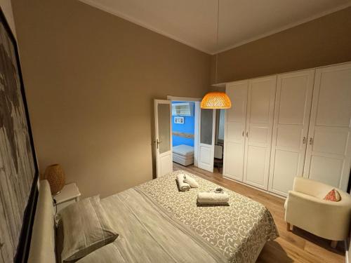 Ein Bett oder Betten in einem Zimmer der Unterkunft Dimora Elizabeth