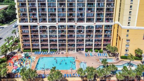 an aerial view of a large hotel with a swimming pool at Cool Coast Ocean View Resort Studio in Myrtle Beach