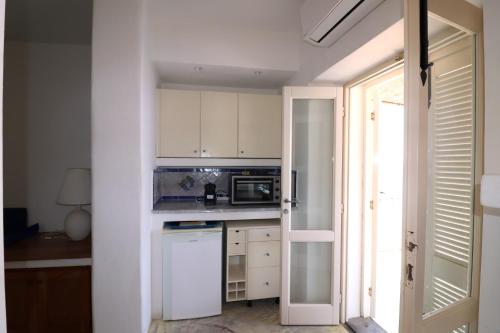 Dapur atau dapur kecil di Casa Uva, sul porto di Malfa