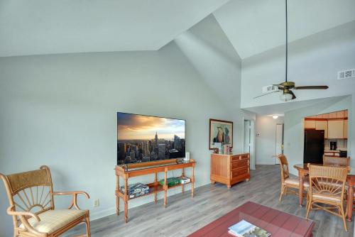 a living room with a table and chairs and a kitchen at 294-1 Moss Oak Circle in Blackbanks