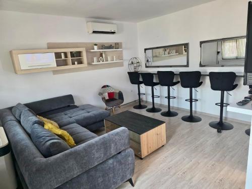 Гостиная зона в Apartman Lucija kuća za odmor s vanjskim bazenom