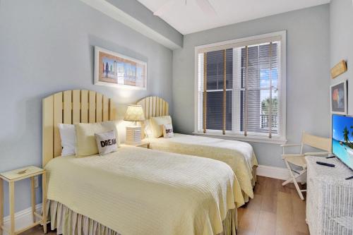 Cama ou camas em um quarto em The Golden Lanai