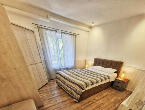 Ένα ή περισσότερα κρεβάτια σε δωμάτιο στο ORY Apartments