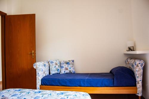 Letto o letti in una camera di Custonaci Addisio Home