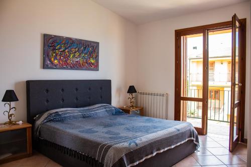 Letto o letti in una camera di Custonaci Addisio Home
