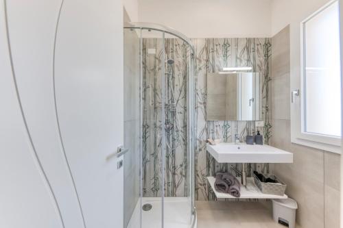 a bathroom with a shower and a sink at Villa dei due mari in Morciano di Leuca