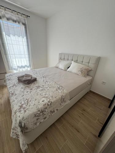 Ένα ή περισσότερα κρεβάτια σε δωμάτιο στο Apartments Svetlana, Igalo