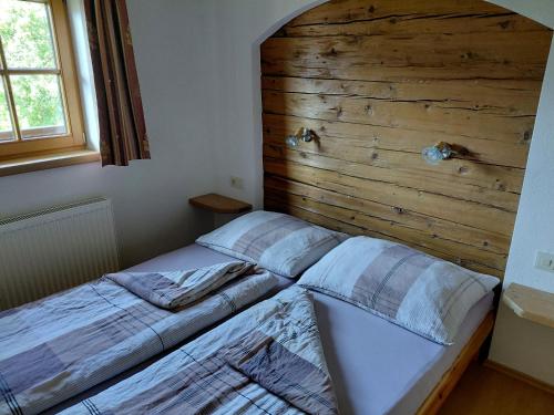Postel nebo postele na pokoji v ubytování BIO Bauernhof GEISL