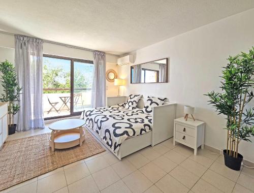 En eller flere senge i et værelse på LX146 - Studio cosy avec balcon & vue mer - Monaco