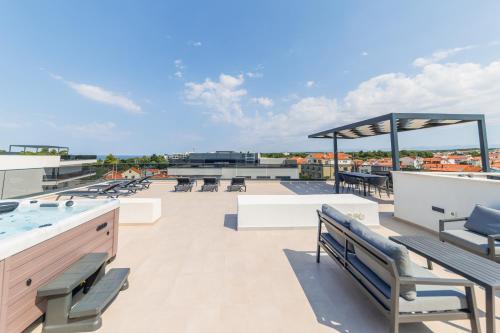 The Skyline Penthouse by Belmont Realty