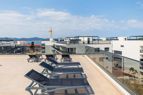 The Skyline Penthouse by Belmont Realty