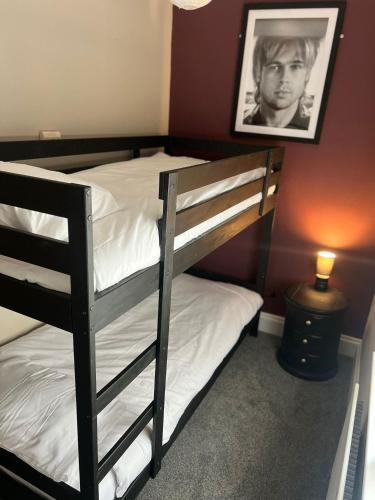 Postel nebo postele na pokoji v ubytování The Cosy Cottage