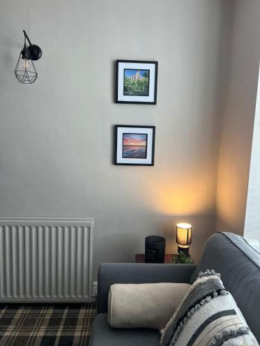 Posezení v ubytování The Cosy Cottage