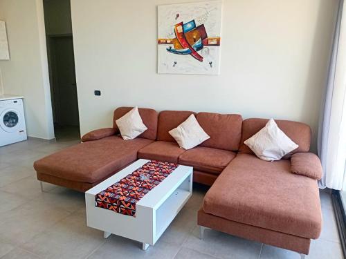 a living room with a couch and a coffee table at Sal Rei apartaments, Boa Vista, free WI-FI in Sal Rei