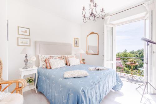 Ένα ή περισσότερα κρεβάτια σε δωμάτιο στο The Sea Air Villa