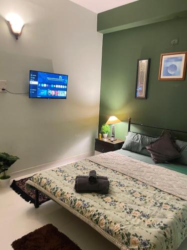 Ένα ή περισσότερα κρεβάτια σε δωμάτιο στο Mizu Hillstay