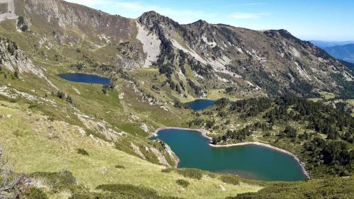 two lakes on the side of a mountain at Balcons de Sorgeat - Chambres d'hôtes - Ecolodge en montagne in Sorgeat