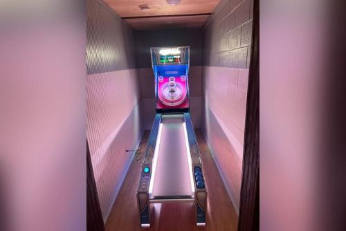 a hallway with an escalator with a dog on it at Serenity By Avada Properties in Sevierville
