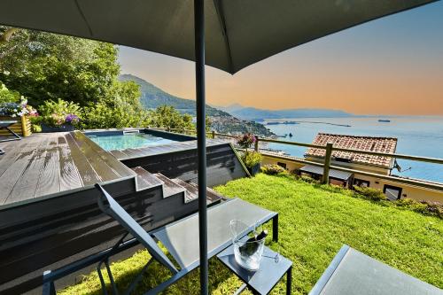 a villa with a view of the water at Kemì Luxury Suites in Vietri sul Mare
