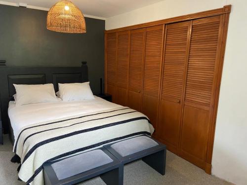 Ένα ή περισσότερα κρεβάτια σε δωμάτιο στο Casa Molino Hotel Boutique & Restaurant Puerto Varas
