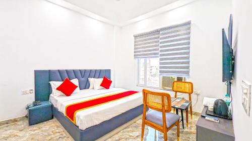 Postel nebo postele na pokoji v ubytování HOTEL GREEN VEGAS