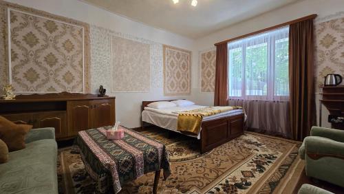 Postel nebo postele na pokoji v ubytování Sanahin Heritage