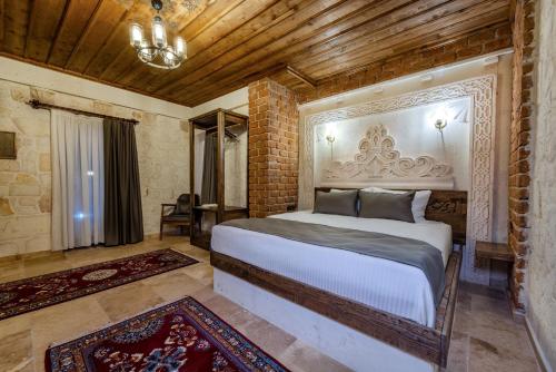 a bedroom with a large bed in a room at Soho Cappadocia in Goreme