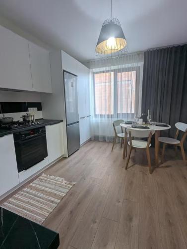 Kuchyň nebo kuchyňský kout v ubytování Central stylish apartment