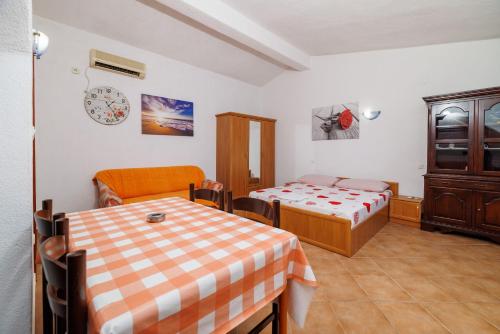 Postel nebo postele na pokoji v ubytování Apartments Jase