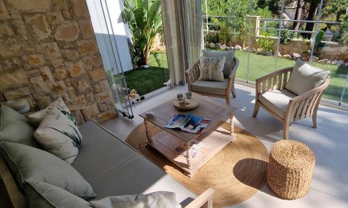 a living room with a couch and a coffee table at Apartment Carpe Diem Ivan Dolac in Ivan Dolac
