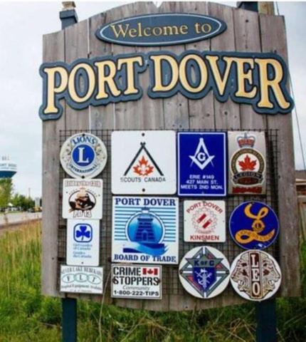 a sign for a port dealer with many signs on it at Forest Bunkie Trails & Stargazing in Simcoe