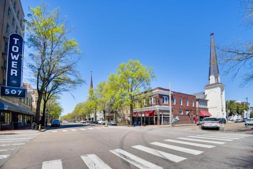 an empty street in a small town with a church at Walk to River and Downtown Portsmouth Apartment! in Portsmouth