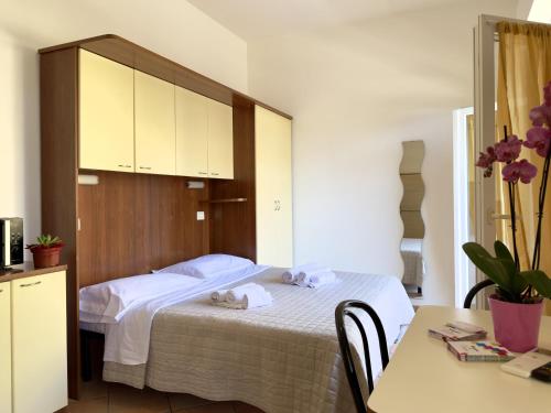Cama o camas de una habitación en Residence Carioca