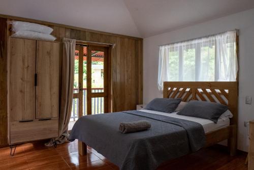Кровать или кровати в номере Blue Surf House