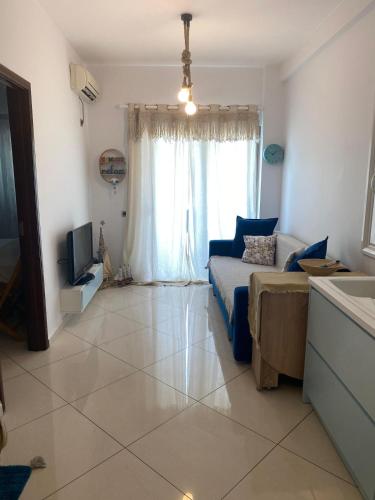 Televisyen dan/atau pusat hiburan di Skylark Apartments - Free Parking
