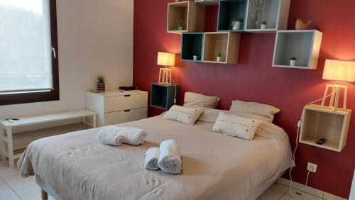 En eller flere senge i et værelse på La petite tuilerie d Eguisheim