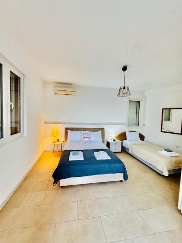 Un ou plusieurs lits dans un hébergement de l'établissement Budva Felix Suites