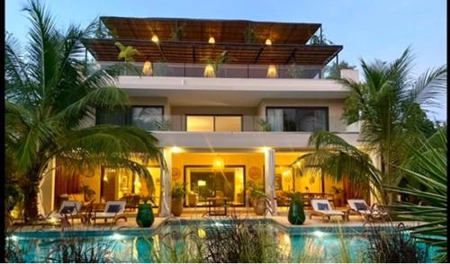 a house with a swimming pool in front of it at Villa YEMAYA - Suite bungalow indépendant in Ngaparou